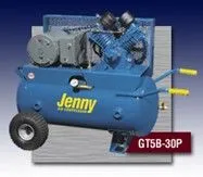 A blue air compressor with wheels is sitting on top of a table A blue air compressor with wheels is sitting on top of a table